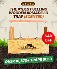 A wooden, humane Armadillo Trap by Armadillo Trap sits on soil with grass behind it. Text reads: "The #1 Best Selling Scented Wooden Armadillo Trap", "$40 off", and "Over 10,370+ traps sold." Brand logo visible.
